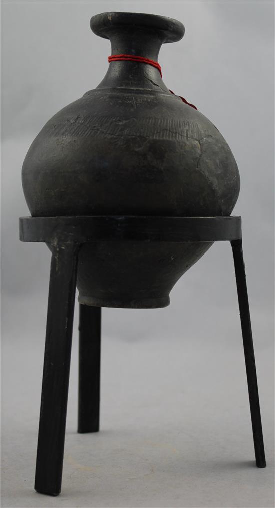 A Greek blackware bottle, Apulia, c.2nd century BC, 15cm, later metal stand